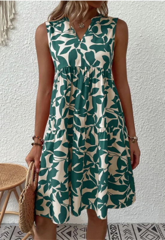 Abito estivo donna A-linea senza maniche con stampa floreale vivace, tessuto leggero e scollo rotondo elegante.