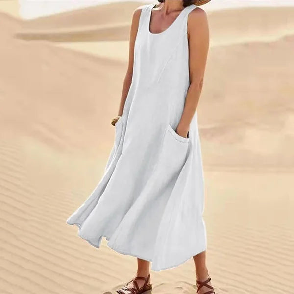 "Abito estivo in lino donna, design rilassato con tasche voluminose, perfetto per un look chic e confortevole."