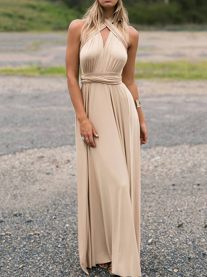 "Abito maxi elegante con vestibilità fluida e stile sofisticato, perfetto per ogni occasione, ideale per la donna moderna."
