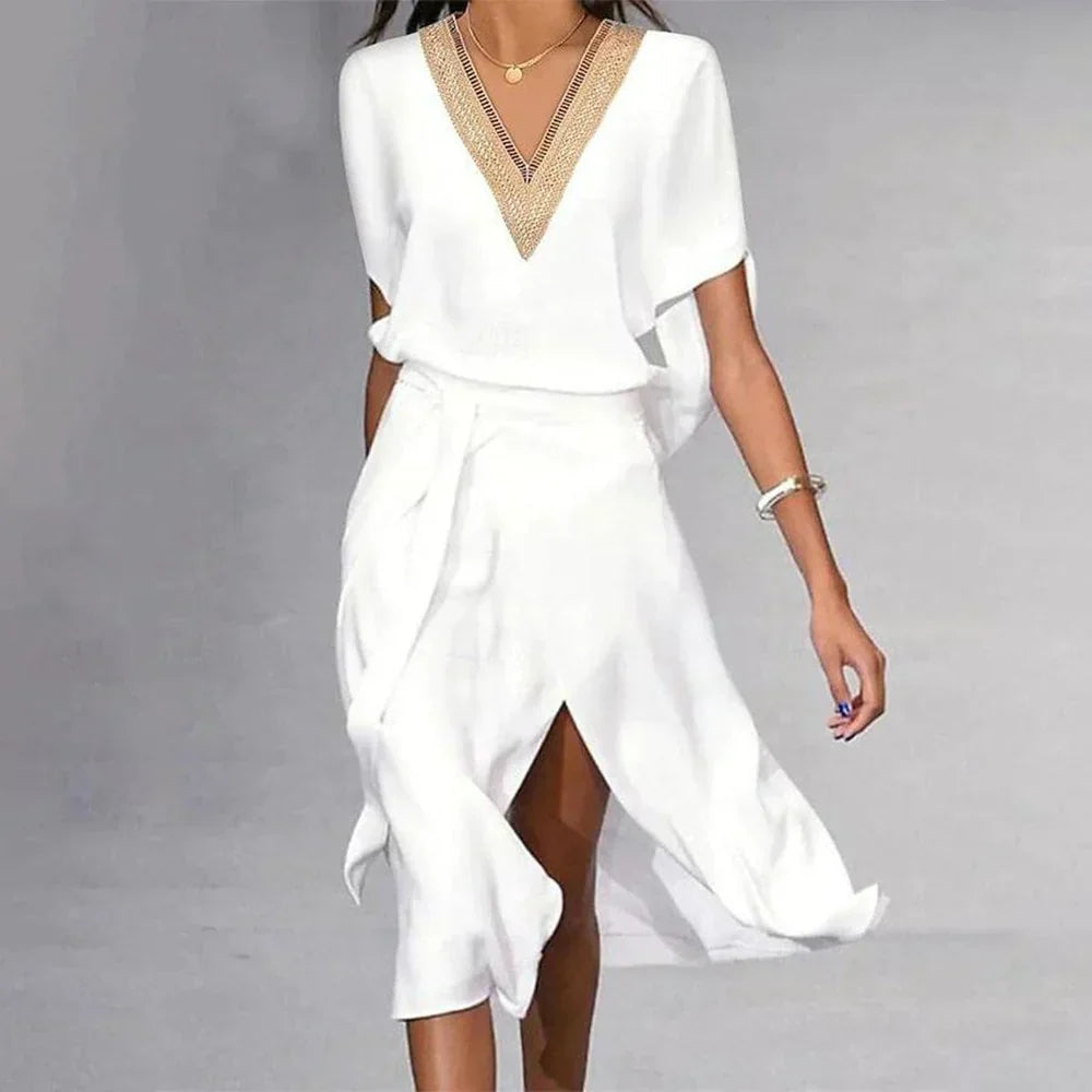 "Abito midi bianco donna, scollo a V, elegante e leggero, perfetto per l'estate, esalta la silhouette con classe."