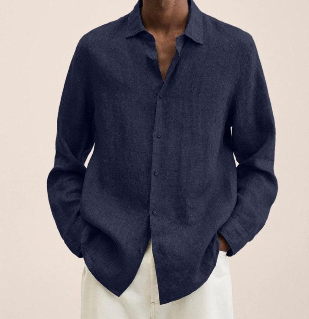 "Camicia classica uomo in lino bianco, maniche lunghe, traspirante e leggera, perfetta per look estivi eleganti e versatili."