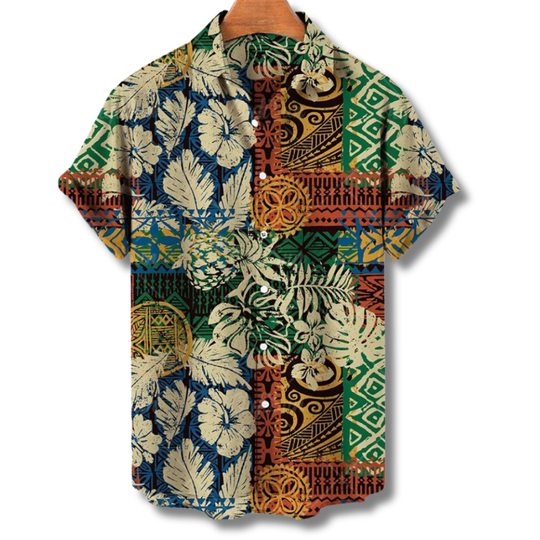 "Camicia Hawaii uomo con stampe tropicali colorate, tessuto leggero e vestibilità estiva, ideale per vacanze e feste."