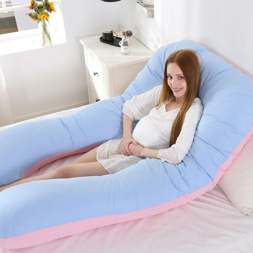 "Cuscino corpo in cotone organico, oversize e ergonomico, per supporto della colonna; promuove un allineamento corretto."