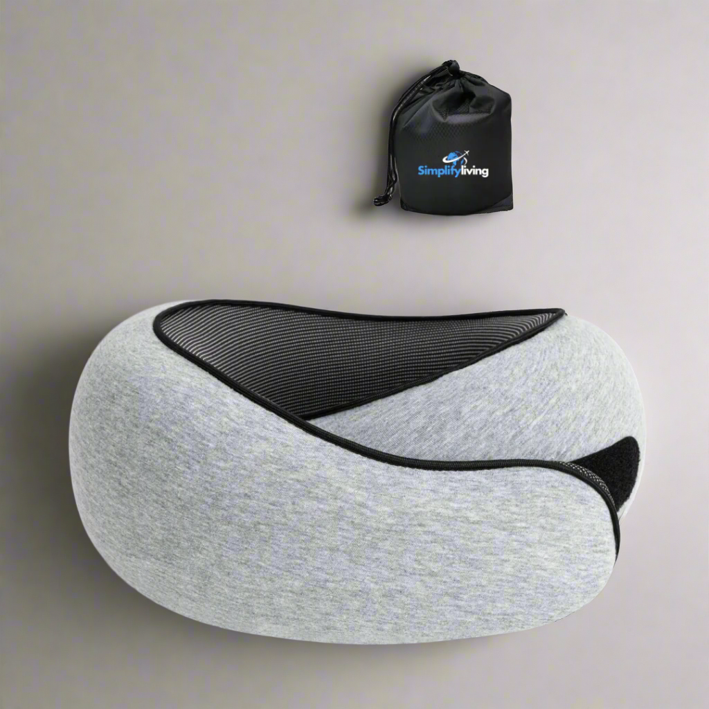 "Cuscino da viaggio unisex comodo e compatto, colore rosa, design ergonomico per supporto collo, ideale per viaggi lunghi."