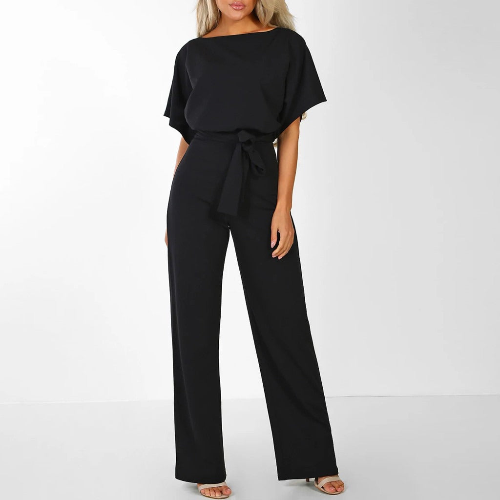 "Jumpsuit donna elegante beige con cintura, design chic e sofisticato, perfetta per eventi formali o casual."