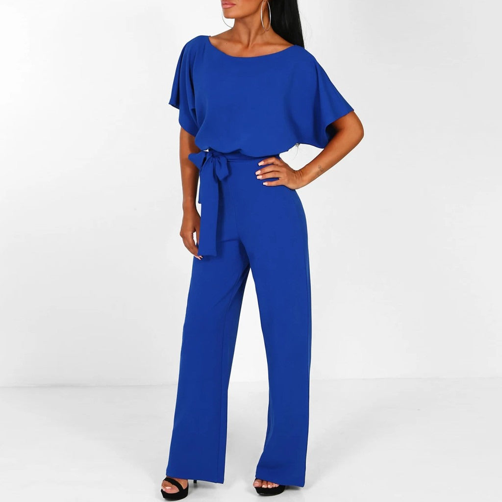 "Jumpsuit donna elegante beige con cintura, design chic e sofisticato, perfetta per eventi formali o casual."