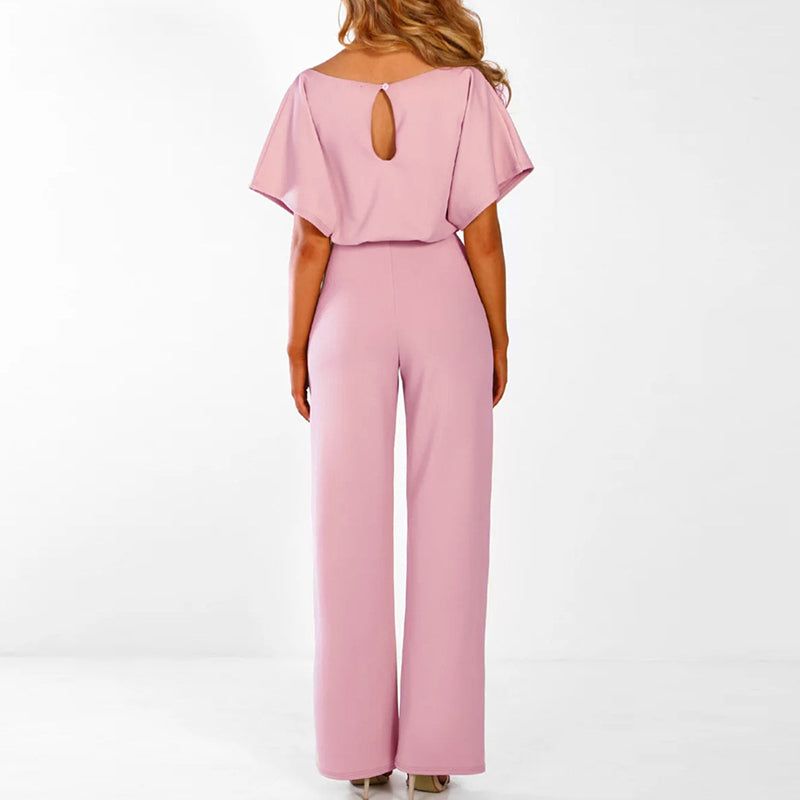 "Jumpsuit donna elegante beige con cintura, design chic e sofisticato, perfetta per eventi formali o casual."