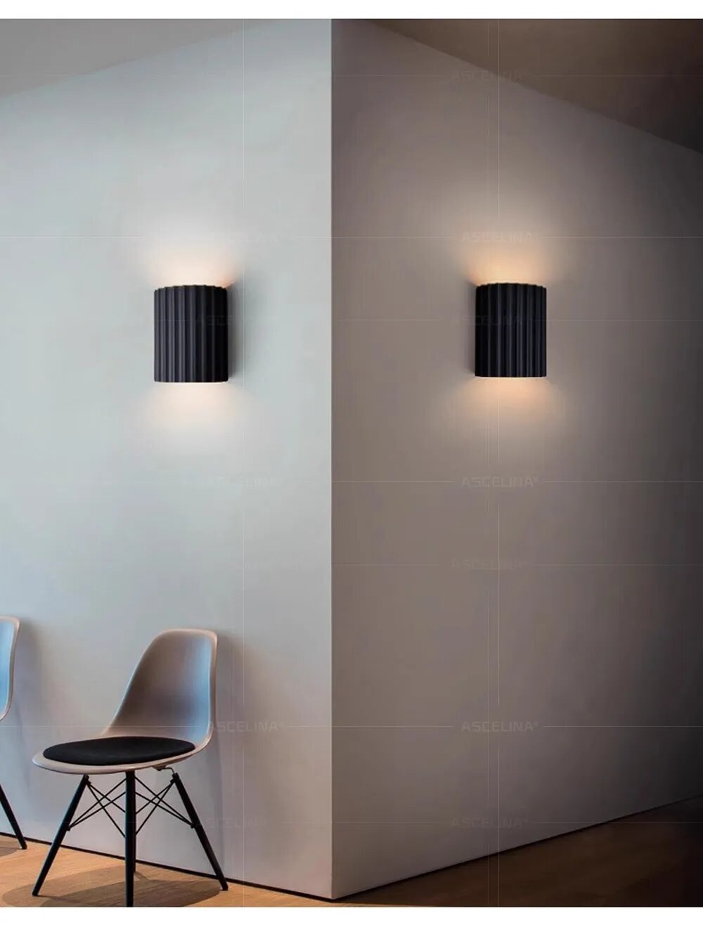 "Lampada da parete moderna in resina con luce LED soffusa, design minimalista; illumina soggiorni e camere da letto."