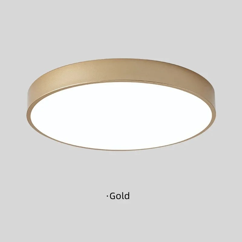 "Lampada da soffitto LED rosa e grigio, design moderno, illumina spazi interni con eleganza e tecnologia efficiente."