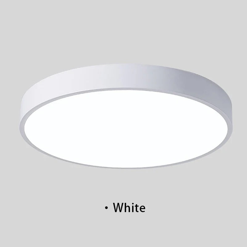 "Lampada da soffitto LED rosa e grigio, design moderno, illumina spazi interni con eleganza e tecnologia efficiente."