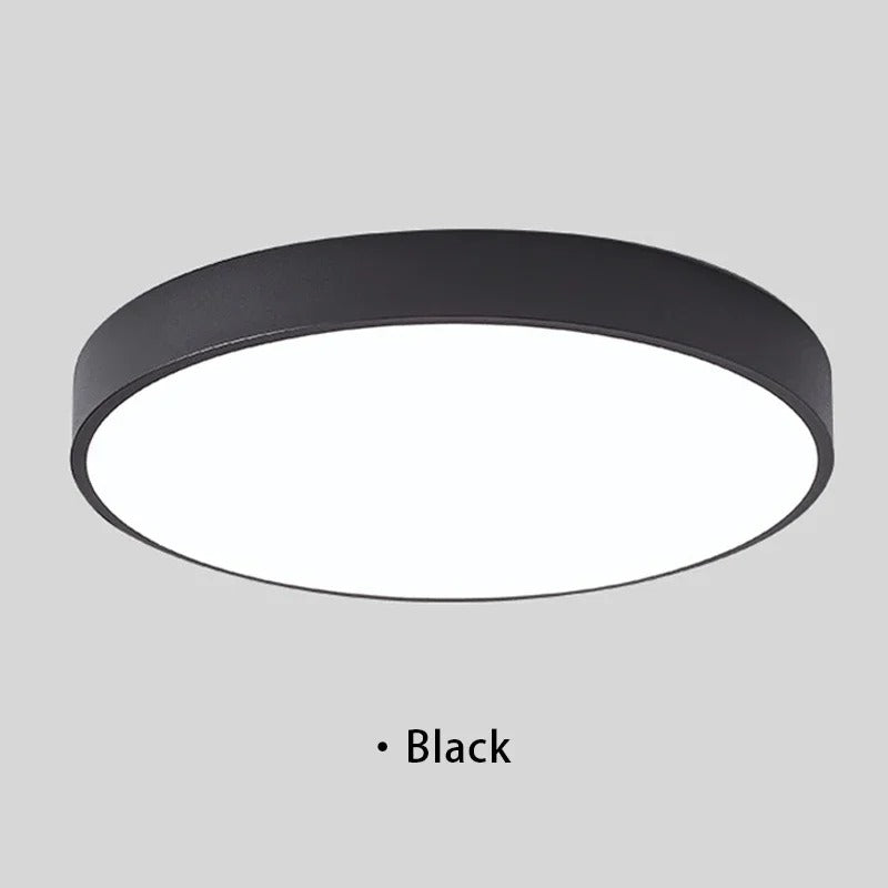 "Lampada da soffitto LED rosa e grigio, design moderno, illumina spazi interni con eleganza e tecnologia efficiente."
