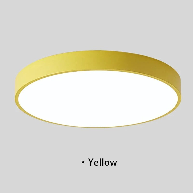 "Lampada da soffitto LED rosa e grigio, design moderno, illumina spazi interni con eleganza e tecnologia efficiente."