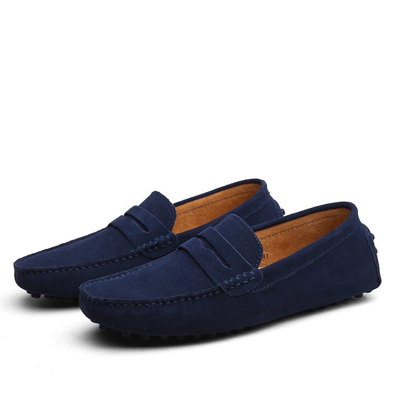 "Mocassini eleganti da uomo in pelle morbida, design moderno, colore nero, perfetti per occasioni formali e casual."