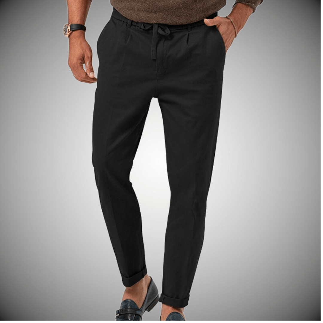 "Pantaloni uomo in lino, eleganti e traspiranti, colore beige, stile rilassato, ideali per look casual o formale."