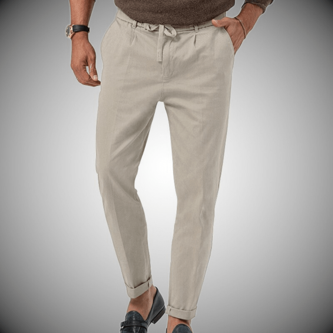 "Pantaloni uomo in lino, eleganti e traspiranti, colore beige, stile rilassato, ideali per look casual o formale."