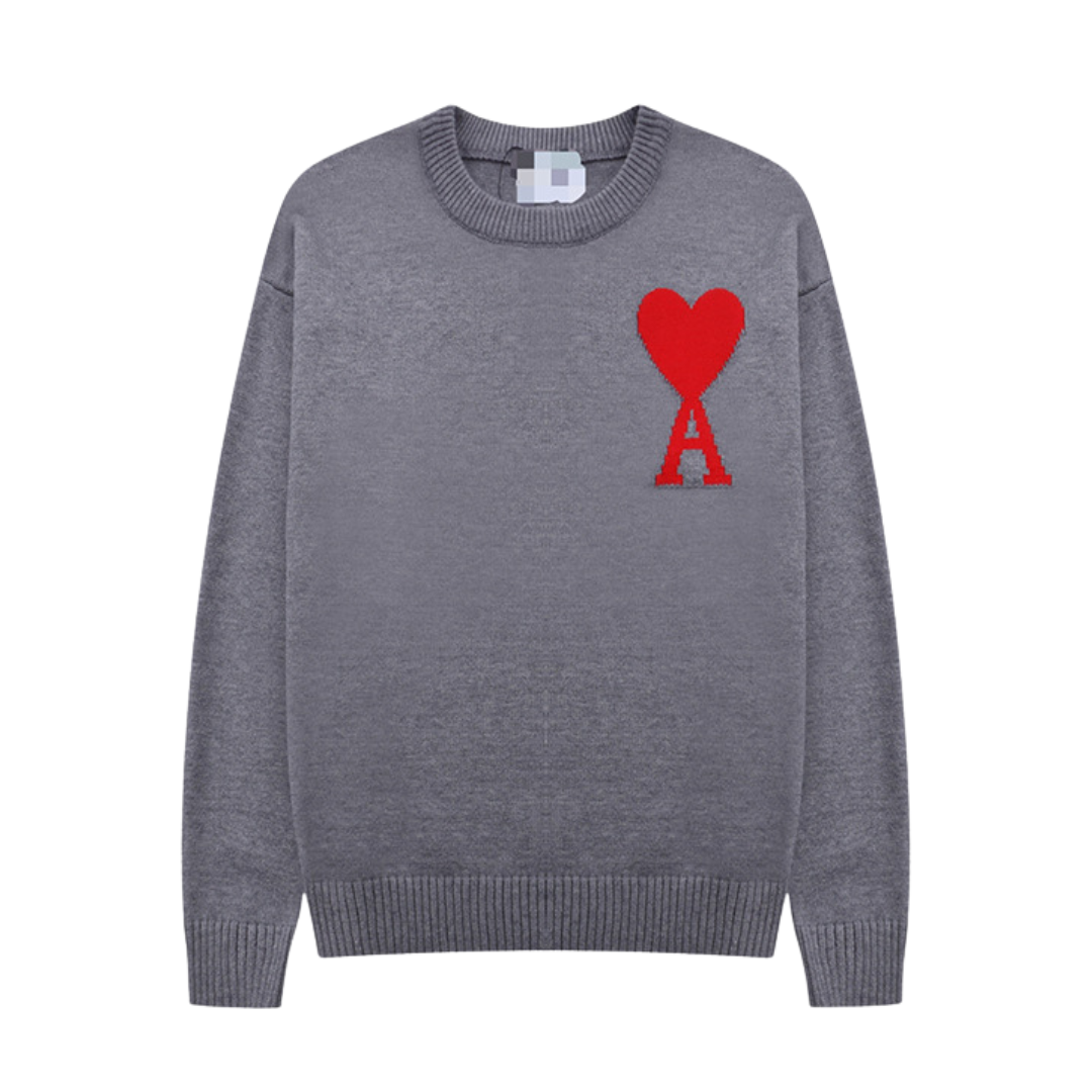 Pullover uomo con motivo cuore, texture morbida, colore grigio e taglio comodo, perfetto per look casual ed eleganti.