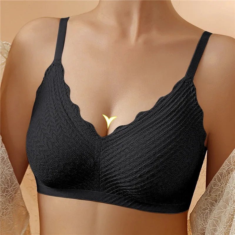 "Reggiseno donna Emilia senza ferretto, cotone bianco; spalline larghe, design traspirante per massimo comfort femminile."