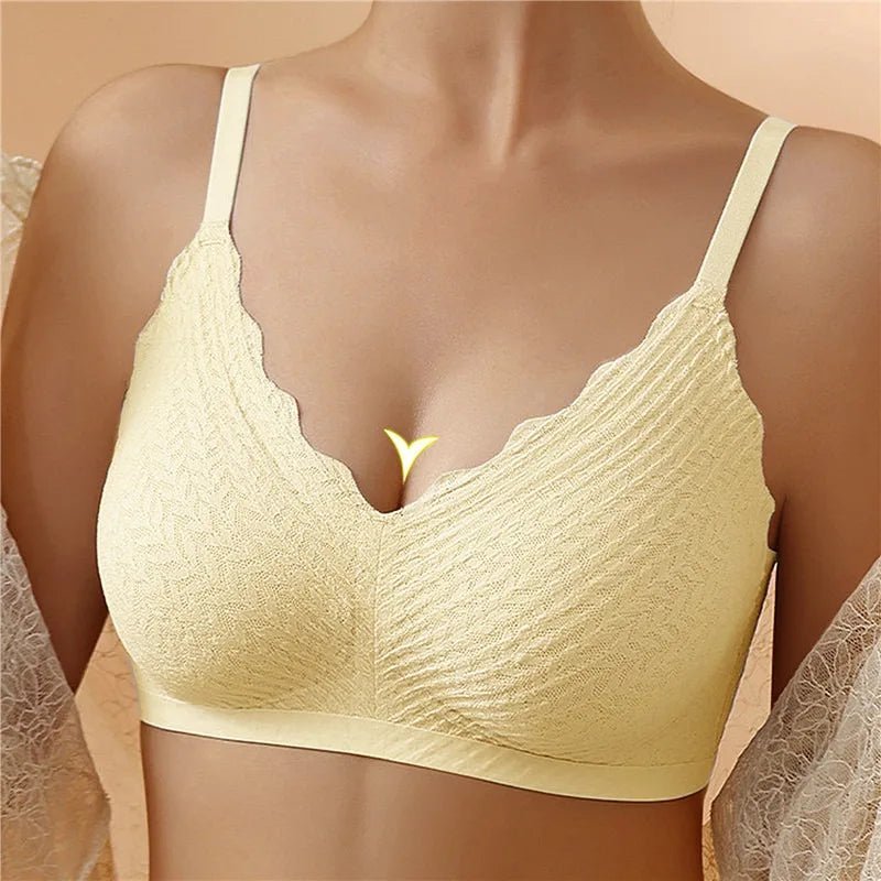 "Reggiseno donna Emilia senza ferretto, cotone bianco; spalline larghe, design traspirante per massimo comfort femminile."