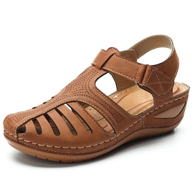 "Sandali ortopedici donna OrthoFlex eleganti in rosa, design ergonomico e soletta adattabile per comfort quotidiano."