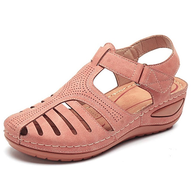 "Sandali ortopedici donna OrthoFlex eleganti in rosa, design ergonomico e soletta adattabile per comfort quotidiano."
