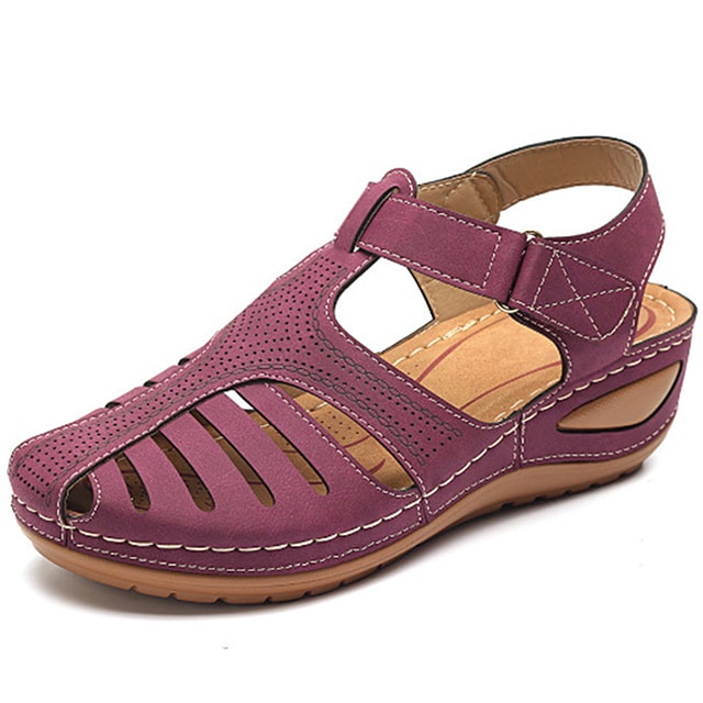 "Sandali ortopedici donna OrthoFlex eleganti in rosa, design ergonomico e soletta adattabile per comfort quotidiano."