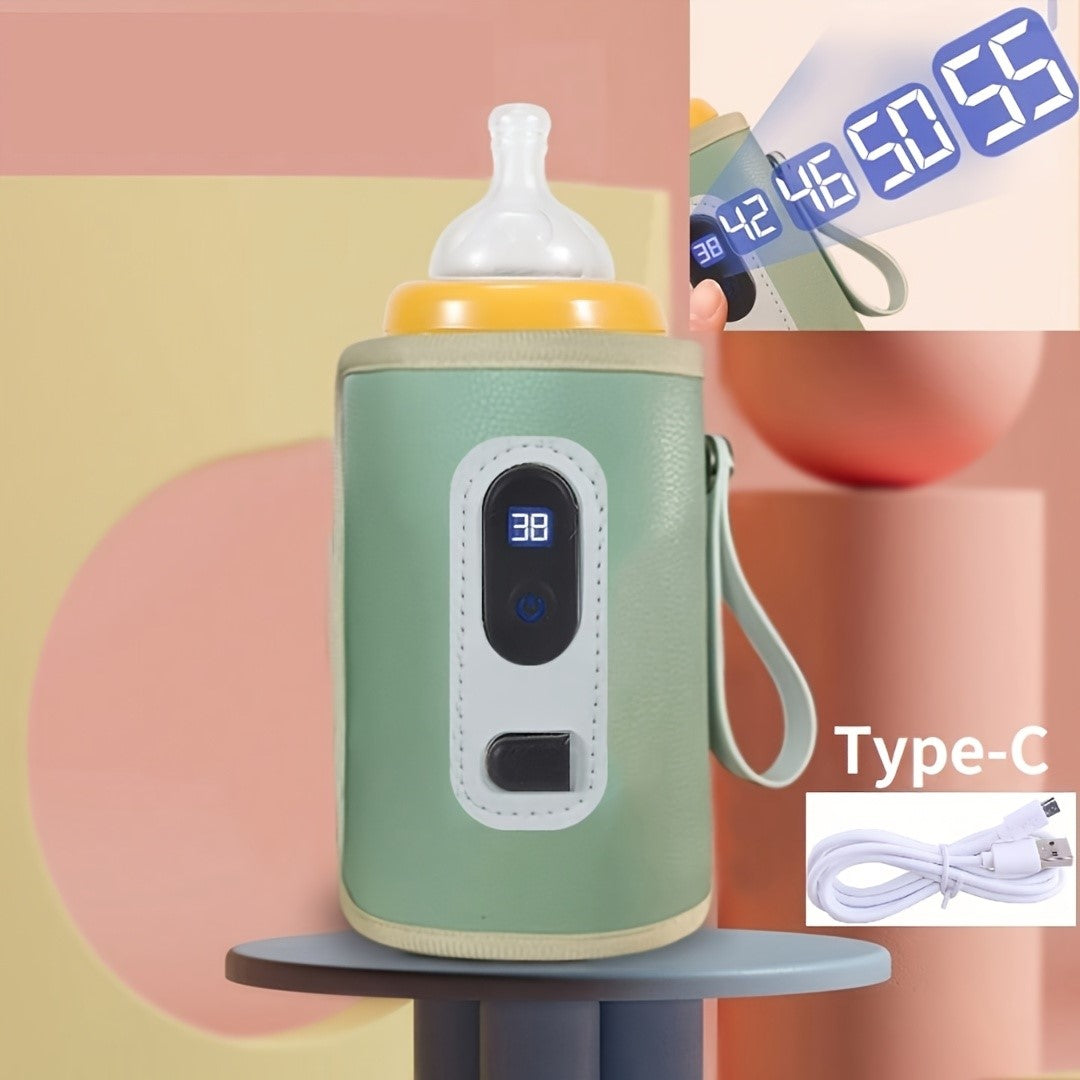 "Scaldabiberon USB portatile, elegante rosa tenue, display digitale, ideale per viaggi, compatto per borsa, pratico per bimbi