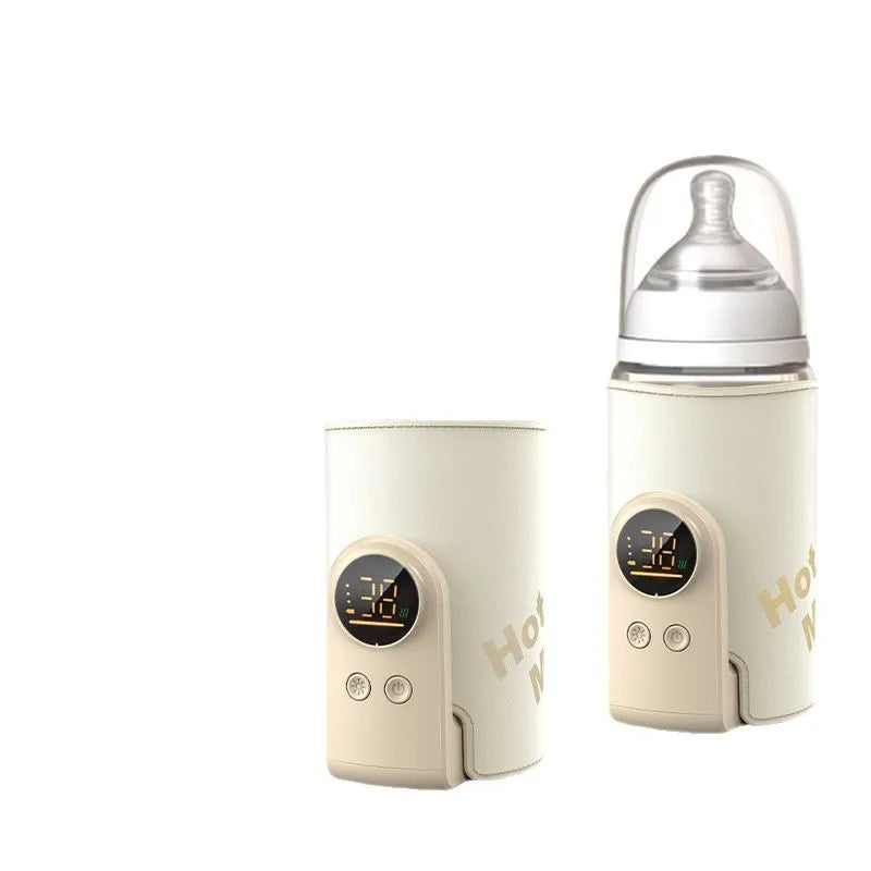 "Scaldabiberon wireless SmartBottle, compatto e ricaricabile, in bianco con display digitale, perfetto per viaggi."