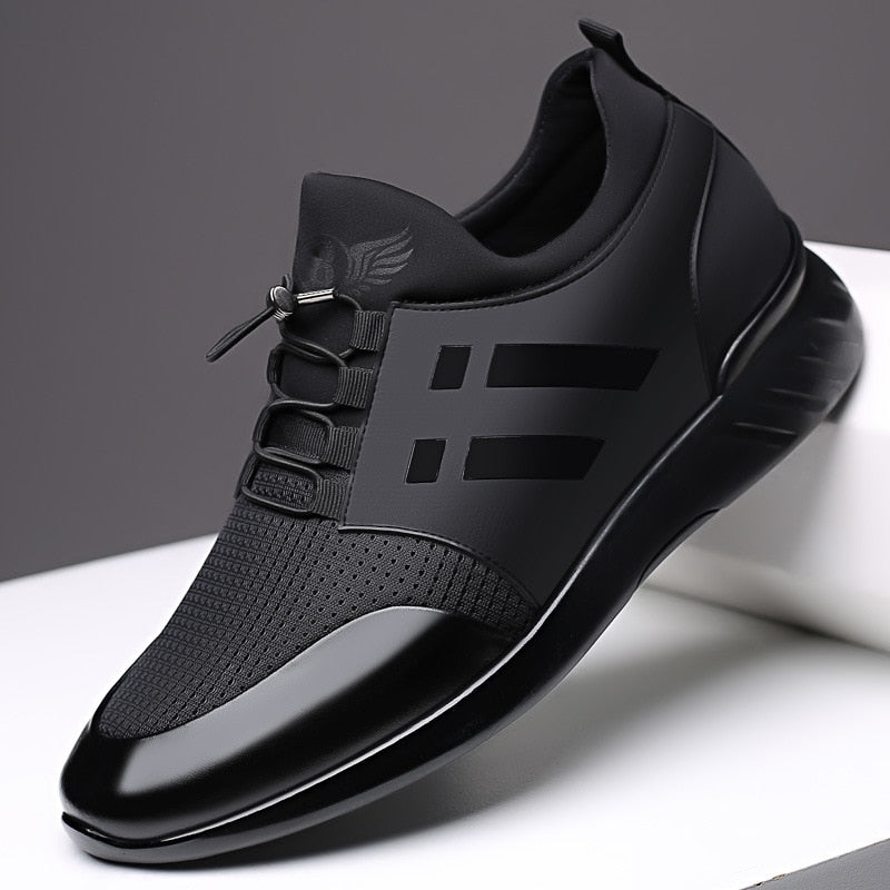 "Scarpe uomo ortopediche in cuoio nero, eleganti e comode, con supporto avanzato, viste lateralmente."