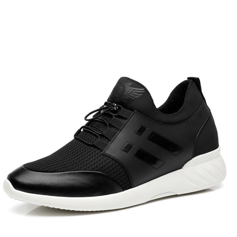"Scarpe uomo ortopediche in cuoio nero, eleganti e comode, con supporto avanzato, viste lateralmente."