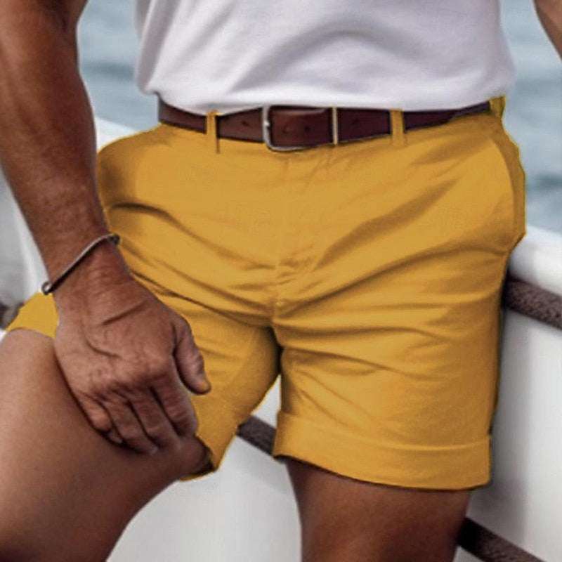 "Shorts estivi da uomo vari colori, tessuto leggero, vita elasticizzata, perfetti per estate e look casual."