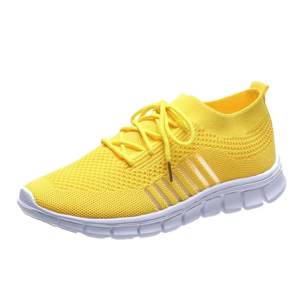 "Sneakers donna eleganti in mesh beige, traspiranti e leggere, con suola ammortizzante e design moderno per ogni occasione."