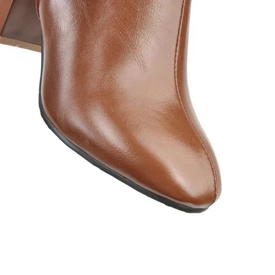 "Stivali al ginocchio da donna con tacco robusto, ecopelle elegante, chiusura zip laterale, perfetti per ogni occasione."