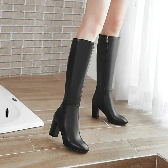"Stivali al ginocchio da donna con tacco robusto, ecopelle elegante, chiusura zip laterale, perfetti per ogni occasione."