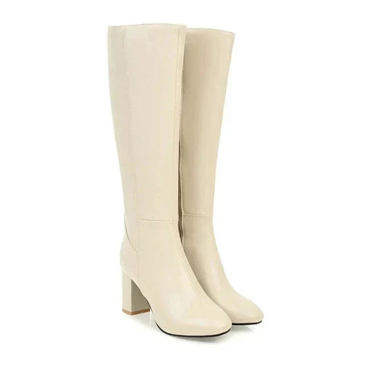 "Stivali al ginocchio da donna con tacco robusto, ecopelle elegante, chiusura zip laterale, perfetti per ogni occasione."