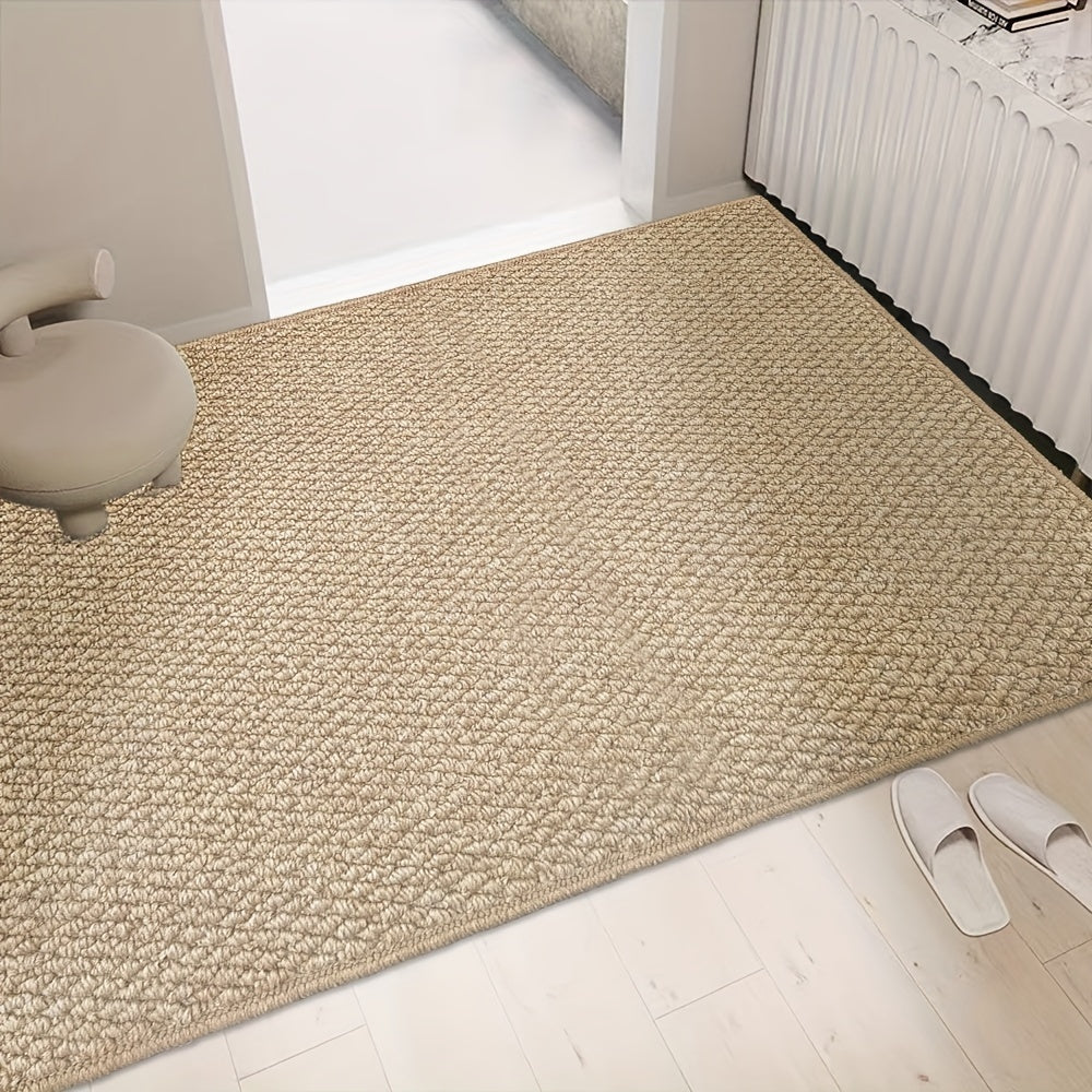 "Zerbino assorbente stile juta con tessuto morbido, colore neutro e base antiscivolo, perfetto per ingressi eleganti."