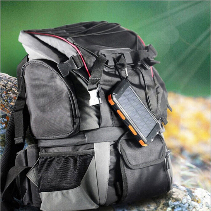 Emergency 10000mAh solar power bank with bright LED light for outdoor adventures and camping