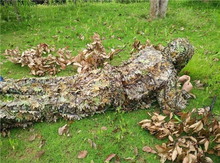 Full-body ghillie suit featuring dense 3D camo for ultimate stealth