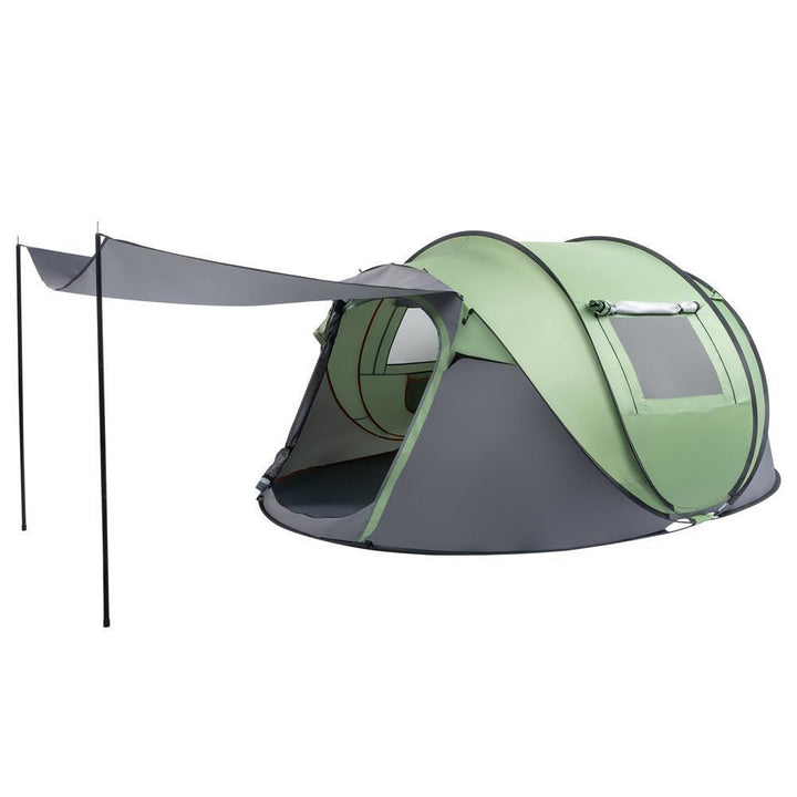 Automatic setup pop-up tent for 4 people, shown on a beach, highlighting its versatility