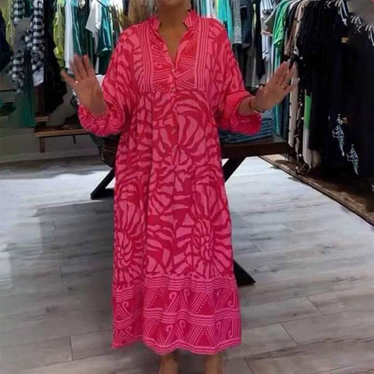 "Abito ampio donna collo V stampa vivace e colori brillanti, perfetto per look eleganti e confortevoli."