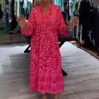 "Abito ampio donna collo V stampa vivace e colori brillanti, perfetto per look eleganti e confortevoli."