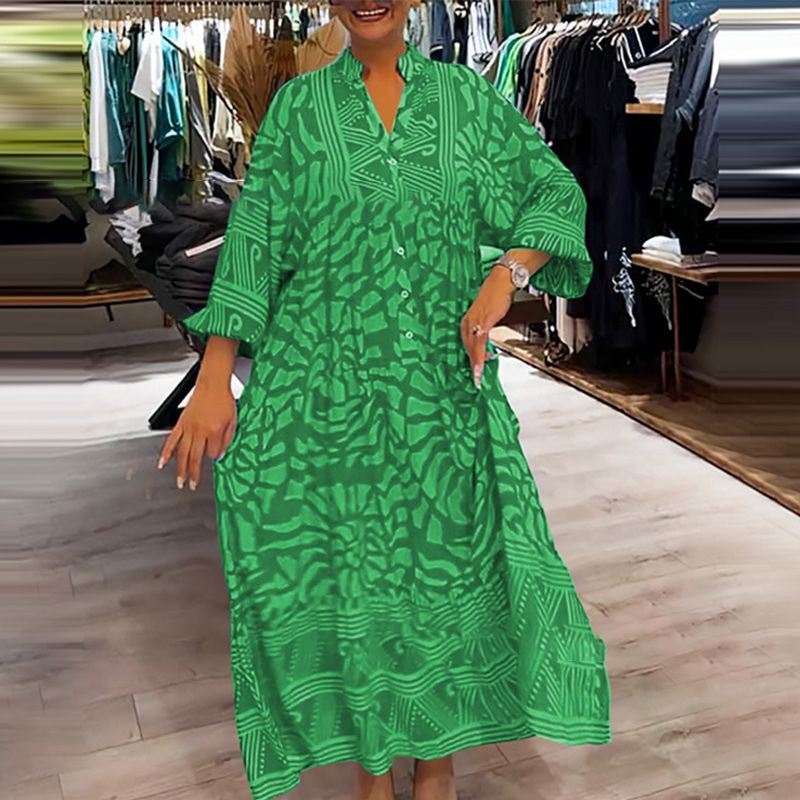 "Abito ampio donna collo V stampa vivace e colori brillanti, perfetto per look eleganti e confortevoli."