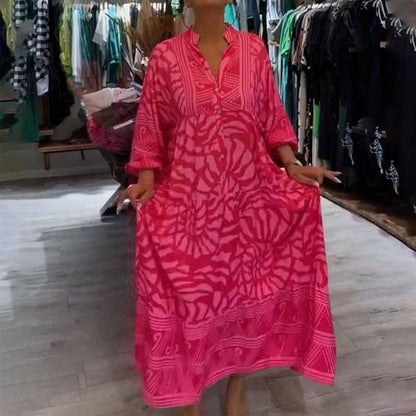 "Abito ampio donna collo V stampa vivace e colori brillanti, perfetto per look eleganti e confortevoli."