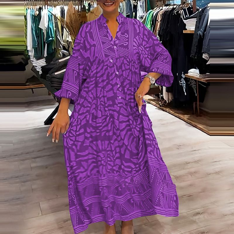 "Abito ampio donna collo V stampa vivace e colori brillanti, perfetto per look eleganti e confortevoli."
