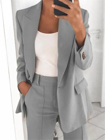 "Abito blazer elegante donna, silhouette sofisticata, vari colori: beige, blu, grigio, marrone, nero, rosa. Perfetto per ogni