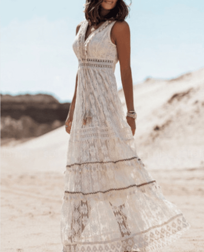 "Abito donna boho elegante, dettagli in pizzo, fluido e comodo, tessuto leggero, ideale per eventi e uso quotidiano."