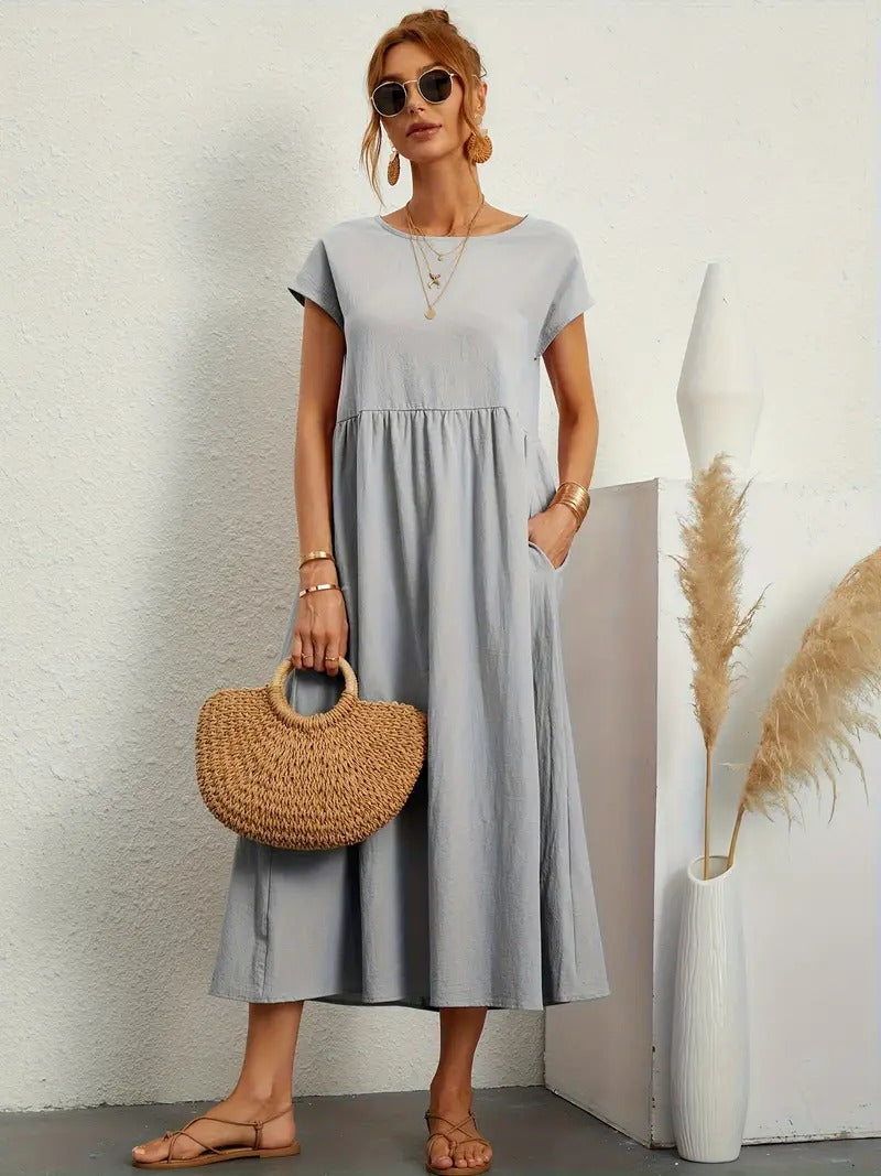 "Abito donna elegante in lino con tasche, colorato e versatile, per un look sofisticato e comodo in ogni stagione."