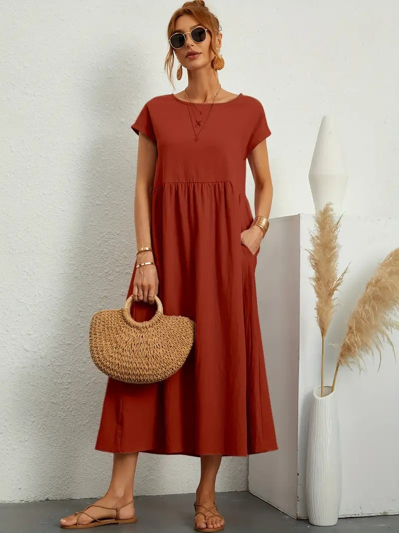 "Abito donna elegante in lino con tasche, colorato e versatile, per un look sofisticato e comodo in ogni stagione."