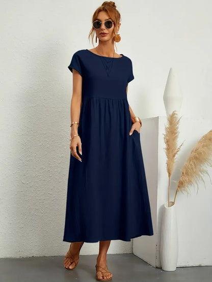 "Abito donna elegante in lino con tasche, colorato e versatile, per un look sofisticato e comodo in ogni stagione."