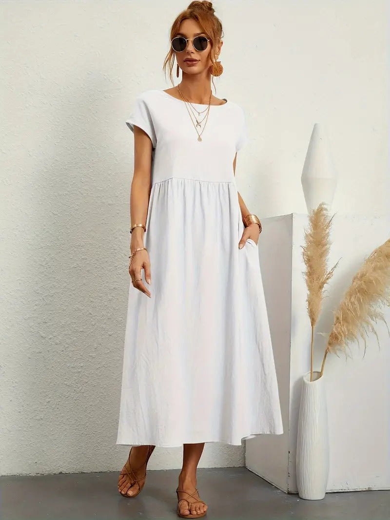 "Abito donna elegante in lino con tasche, colorato e versatile, per un look sofisticato e comodo in ogni stagione."
