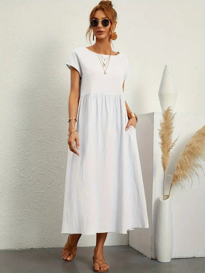 "Abito donna elegante in lino con tasche, colorato e versatile, per un look sofisticato e comodo in ogni stagione."